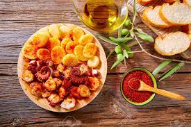Add cooked potato and saute until heated through. Tapas Pulpo A Feira With Octopus Potatoes Gallega Style And Paprika Recipe From Spain Stock Photo Picture And Royalty Free Image Image 51853610