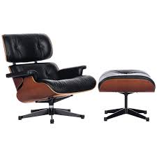 Settle into the generous wingback design to appreciate this chair's smart, welted arms and its matching ottoman. Vitra Eames Large Leather Lounge Chair And Ottoman Black Palisander At John Lewis Partners