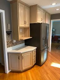 The process of pickling wood cabinets involves applying a white stain or whitewash, which gives it a white surface while still retaining the appearance of the wood grain. Dated Pickled Maple Cabinets Michelle Drechsel Designs Facebook