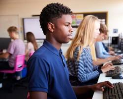 Image of Students coding in a classroom