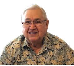 WADE'S PHARMACY Walter, Clara, and Gerald Wade Walter Wade, shown with his  wife, Clara, and son Gerald, went to work at Fernish's Drugstore in 1938.  The Fernish family sold the business to