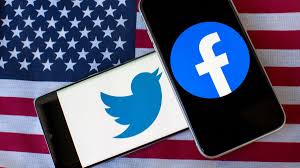 Facebook, twitter and instagram logos printed on white paper. Trump Blocked From Twitter Facebook Snapchat After Violence On Capitol Hill Cnet