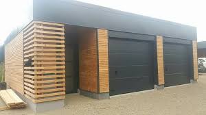 Garage En Ossature Bois Barde De Douglas En Faux Clair Voie Et Alu Double Garage Et Atelier Ferme Agbois Maison Ossatur Garage Moderne Maison Maison Bois