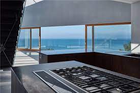Kevin mccloud follows people as they build their dream house, often focusing on modern design, energy efficiency, maximizing space and views. Guy Greenfield Designed Stealth House In Ilfracombe Devon Wowhaus
