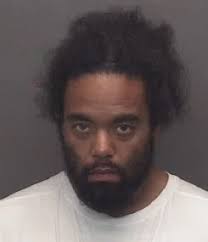 Suspect Held At Gunpoint By Resident Following Break-In