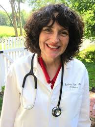 Marilyn's majorettes with a large poodle