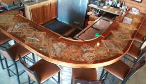 Epoxy leaves a clear hard coating to help protect your counter top from future damage. Inlayed Bar Top 3 Epoxy Resin Coatings Casting Mold Making More Environmental Technology Inc