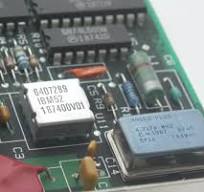 Teardown of a quartz crystal oscillator and the tiny IC inside
