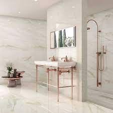 Gold tiles bring a brilliant opulence to your bathroom or wet room. Trapani Gold Marble Effect Porcelain Tiles From Alistair Mackintosh