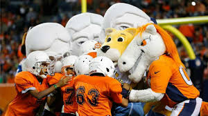 Denver nuggets rocky the mascot was trying to cheer the crowd because denver had score a 3 point shoot against the. Denver Nuggets Mascot Lays Out Youth Football Player Sports Illustrated