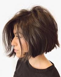 A beautiful idea for naturally wavy hair that holds a ton of body. The Most Flattering Short Haircuts For Thick Hair Southern Living