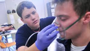 Jonathan Dyer works in class using TN Promise