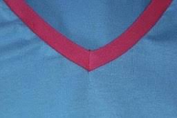 Sewists, ever wonder how to sew bias binding on an inside corner? Tutorial V Neck T Shirt Binding Sewing