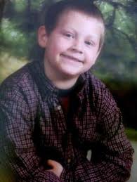 Boy burned in condo fire dies