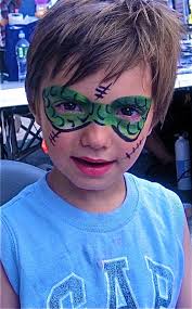 Face Painting...super hero.By Hearts Face Painting.