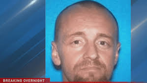 Manhunt suspect who fired