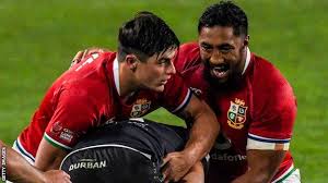 British and irish lions centre elliot daly (l) breaks away from sharks centre werner kok (r) to score during a the british and irish lions have been reassured of their safety amid a mounting death toll related to looting and arson in south africa, a security official with the tourists told afp on wednesday. 1eelifyif4pzym