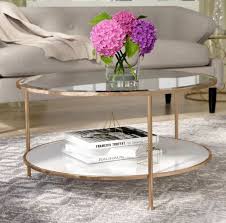 We went in search of the best small, round coffee tables that maximize any room, no matter the layout. K Modern Glass Coffee Table Living Spaces Coffee Table Infinity Mirror Coffee Table Three Piece Coffee Table Set Oval Oak Coffee Table Small Round Coffee Table With Storage Lacquer Coffee Table White