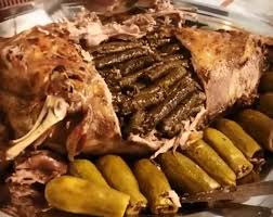 طريقة عمل خروف محشي بورق العنب و الكوسا طريقة