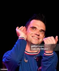 JK as Robbie Williams and Robbie Williams' father, Pete Conway, out... News  Photo