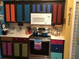 The Beginning Of My Colorful Boho Kitchen Cabinets Made Chalk Paint Using Sample Size Jars Of Paint Boho Kitchen Kitchen Cabinets Colorful Boho Kitchen