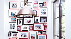 After building rustic picture frames out of some scrap lumber we designed a unique way to hang them on our dining room wall. 16 Photo Display Ideas For Family Pictures Architectural Digest