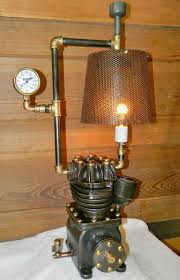 Steampunk Table Lamp Made With Parts From An Old Air Compressor And Other Scrap Metal Industrial Lamp Design Lamp Metal Lamp