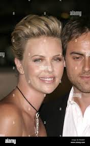 Charlize theron and stuart townsend hi-res stock photography and images