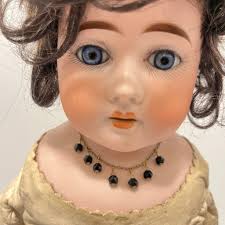 Value of 21 inch ceramic bisque doll?