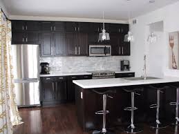 Black mist granite is an elegant black stone that will look great in any kitchen setting. Black Marble Counter With White Cabinets Novocom Top