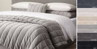 Backed and edged in satin, this utterly romantic garment dyed coverlet drapes dreamily on any bedframe in. Quilts Coverlets Rh