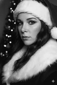 Portrait of woman in red santa outfit