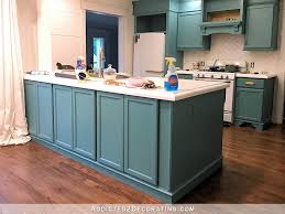 Deep tones from our dark wood, espresso, or cinder collections instantly add class and luxury to any kitchen. My Freshly Painted Teal Kitchen Cabinets Addicted 2 Decorating