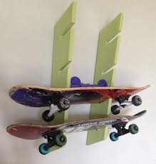 I also cut a 5/8″ x 7 5/8″ slot at the bottom of the skateboard rack to leave room to clear my trim moulding/base boards. How To Make A Skateboard Rack Fast And Cheap Skateboarder Skateboard Racks Diy Skateboard Rack Skateboard Storage