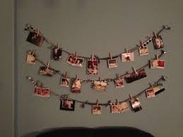 A Cute And Simple Way To Hang Photos Without Frames Or Tape 1 Hang Decorative Doorknobs Hanging Pictures On The Wall Family Picture Frames Hanging Pictures