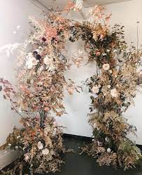 Maybe you would like to learn more about one of these? Wedding Arch Backdrop Natural Dried Flowers Wedding Ideas 2019 Wedding Trends Dried Flowers Wedding Wedding Arch Flowers Flower Installation