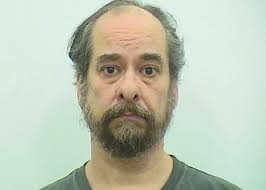 While pleading his innocence, Quincy man sentenced to eight years in prison  for child pornography