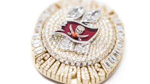 Tampa bay buccaneers quarterback tom brady holds up the vince lombardi trophy after defeating the kansas city chiefs in the nfl super bowl 55 football game sunday, feb. The Making Of And Story Behind The Bucs Super Bowl Lv Championship Ring Youtube