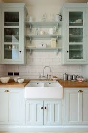 Other than a few other pops of color, the rest of the kitchen is white, allowing the island to take center stage. 25 Butcher Block Countertops For Your Kitchen Shelterness