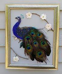 Filling the walls of every 'fixer upper' home with unique wall art. Peacock With Real Peacock Feathers Feather Crafts Feather Decorations Diy Feather Decor