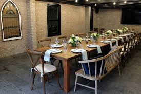 The counter chairs are covered in a complementary textured gray. Private Dining Events La Cucina Falmouth Easton
