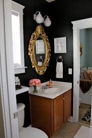 An oversized map pops against the emerald wall, while new tiles and fixtures pull the look together. Room Decorating Before And After Makeovers