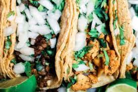 To assemble the tacos, add a bit of the cabbage slaw to a warmed tortilla. Local Favorites Big Island Guide