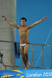 Tom daley climbs up to the diving board, wipes the sleep from his eyes and yawns. Olympics 2012 Tom Daley And Team Gb Divers Pose Mid Air For Camera Phone Pictures Daily Mail Online