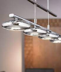 It features a rectangular backplate made from steel in a variety of finishes to choose from that best fit your space. Chrome Rise And Fall Four Light Pendant