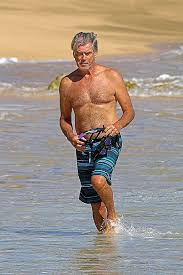 Pierce brosnan and keely shaye smith tied the knot in 2001 and share two sons: Pierce Brosnan Is Shirtless Buff Kissing Wife Keely On Beach Hollywood Life