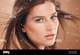 Woman, face skincare or windy hair