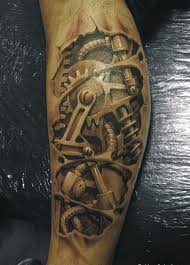 Biomécanique super sur le mollet. Tatouage Mollet Homme 15 Idees De Tatouages Pour Les Mollets Photos Tatouage Pour Homme Idees Et Motifs Tattoos