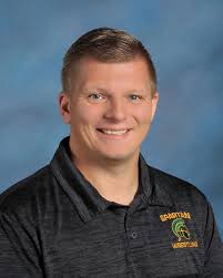 Teacher Tuesday! 🏋🏻🤼‍♂️✝️⚔️🔰Meet Coach Tony Romano, our Physical  Education Department Head. Besides helping Spartans grow in their health  and fitness, Coach Romano is an amazing spiritual leader in our building. A  successful