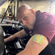 Are there shops in Chapin that offer free tire rotations with oil change?